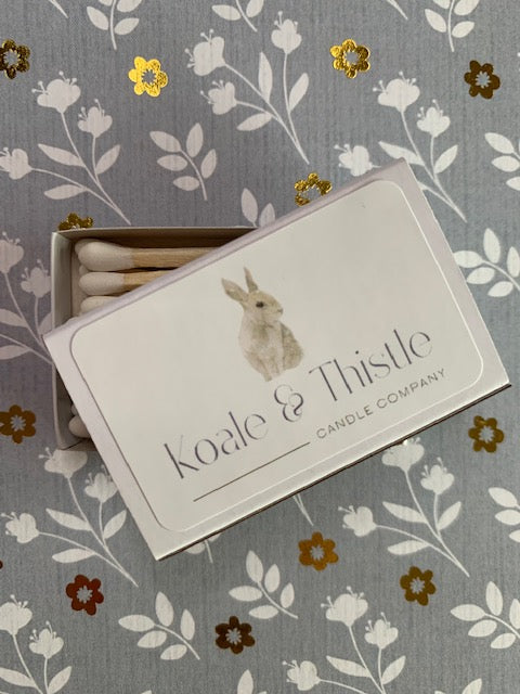 Koale and Thistle matchbox on grey flower background